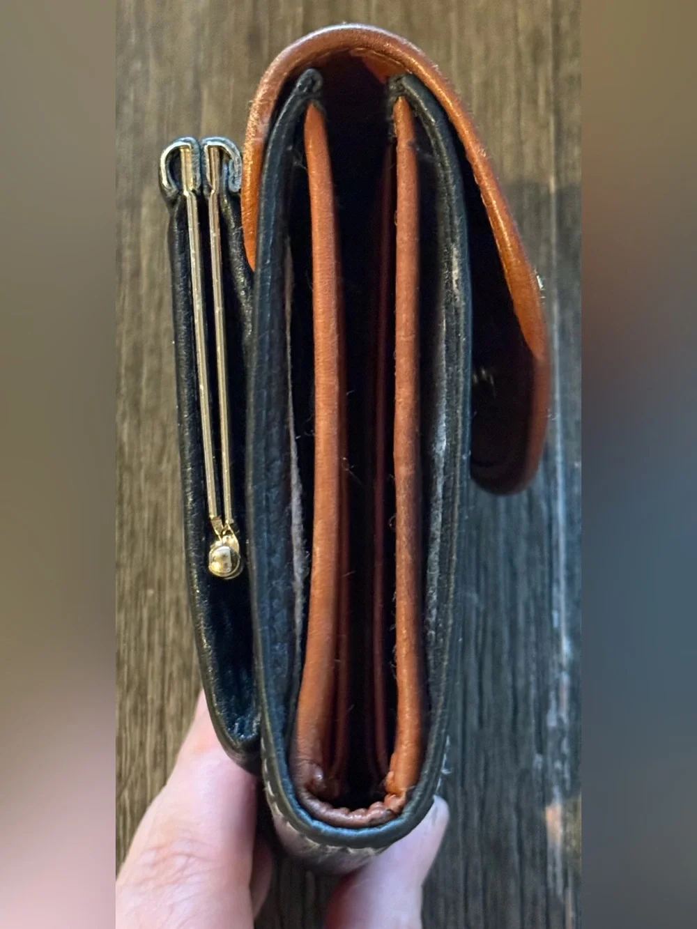 Dooney & Bourke Black Leather Wallet with Brown Trim
